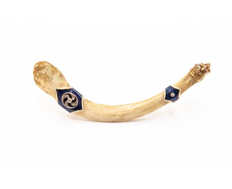 A Russian enamel and diamond brooch, possibly made from a duck bone, with bands of quilloche enamel and diamonds, and a gilt 