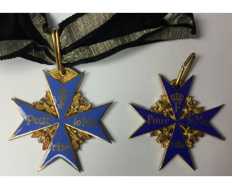 Reproduction WW1 Imperial German Pour Le Merite "Blue Max". With a short section of ribbon. Some slight surface enamel chippi