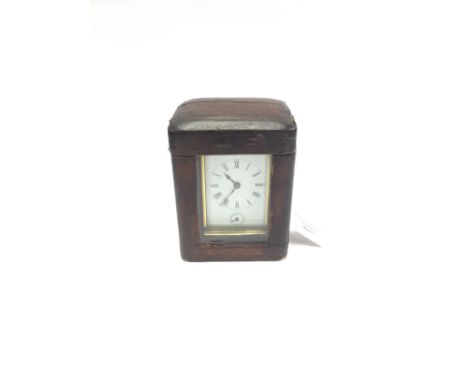 19th Century French brass carriage clock in leather travelling case with bevelled glass panels