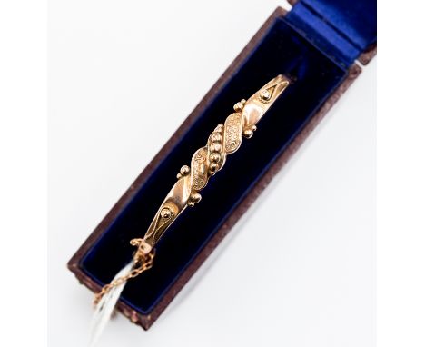 A Victorian 9ct rose gold bangle, granular and engraved details, hinged, internal diameter 60mm, a/f, total gross weight appr