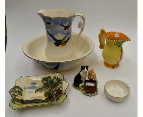 A collection of ceramics comprising bowl, jug and soap dish set, a Burleigh ware Squirrel jug, a James Herriott 'Border Fine 