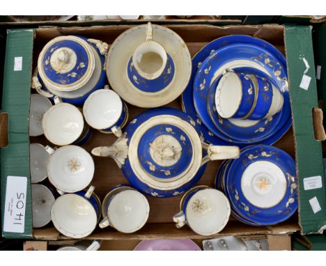 A mid 19th Century part tea set, including tea pot, sugar bowl and cover, milk jug, slope bowl, 17 cups etc. White ground dec