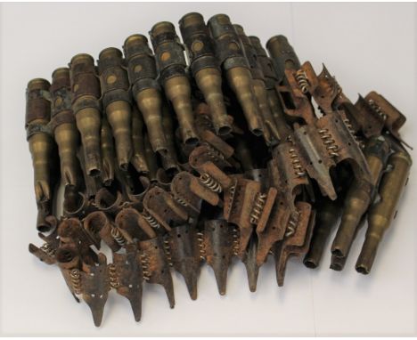 WW2 Third Reich MG34/MG42 50 round metal ammunition belt, no markings: 39 expended blank 7.62mm NATO rounds in a disintegrati