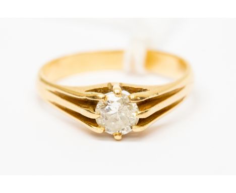 A diamond solitaire ring, approx 0.70 ct, assessed 18ct gold mount; a gents signet ring size V½. Total gross weight 5.5 grams