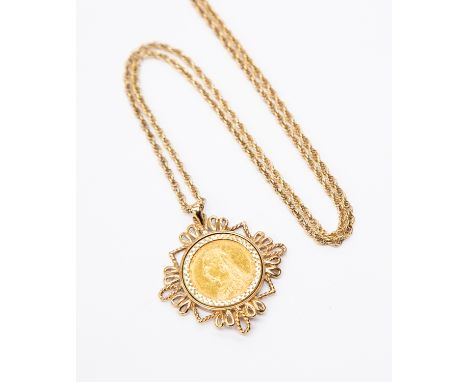 A Victoria 1892 22 ct gold Sovereign pendant, fitted in a 9 ct gold engine turned mount, with a fancy link chain, 19.27 grams