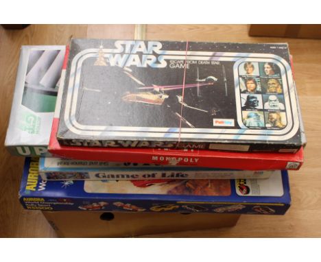 Collection of board games including Monopoly, Magic Robot, Star Wars Escape from Death Star, etc, along with Aurora World Cha