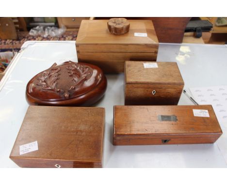 A acorn and oak leaf (mahogany jewel box) carved; an oak tea box, cigarette boxes and a more modern jewel box with Yorkshire 