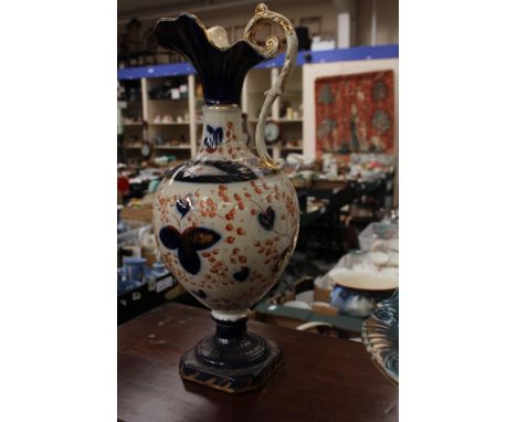 A pair of late Victorian urn vases along with a wash bowl and jug