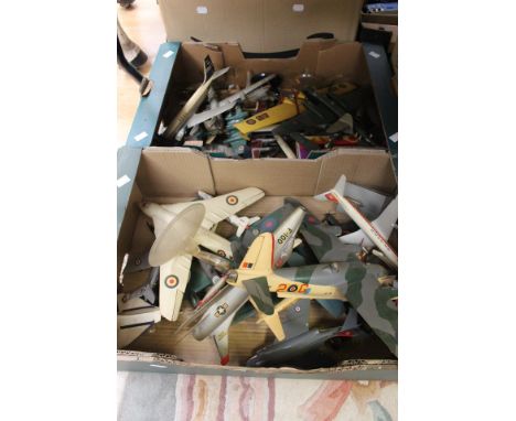 A collection of model planes, unboxed, possibly Airfix style, some on stands, two boxes