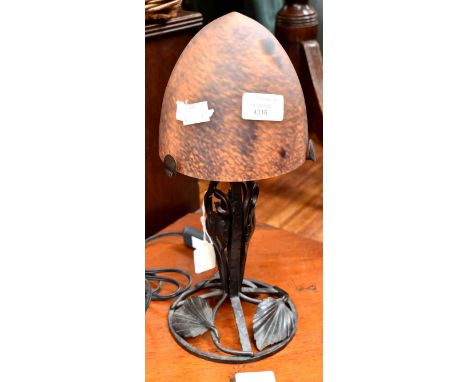 Art Nouveau domed glass table lamp upon a foliate design wrought iron base