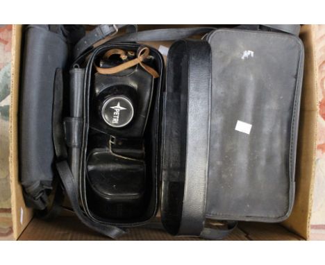 3 camera cases with 4 Petri cameras and 1 Yashica camera (1 box)