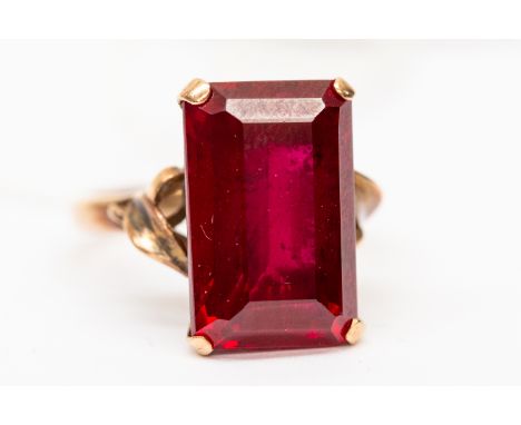 A 14 ct synthetic ruby emerald cut ladies dress ring, size L ½, 5.5 grams approx