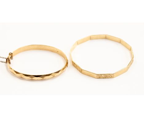 A 9ct gold faceted design slave bangle with engraved design, weight approx 13.5 grams  together with a rolled gold hinged ban