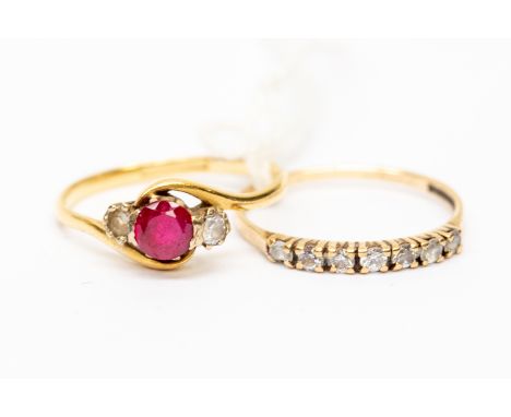 An 18ct gold and paste set dress ring, total gross weight approx 2.5gms, along with a white stone set 9ct gold eternity ring,