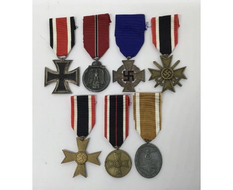 A collection of WW2 German medals.To include: an Iron Cross 2nd Class with makers mark ‘4’ on suspension ring (Steinhauer & L