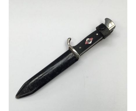 Pre WW2 Hitler Youth knife, with associated scabbard.Non motto, transitional era type, dated 1936 and carrying the RZM mark M