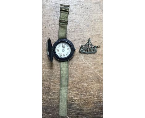 British WW2 jedburgh SOE wrist compass with original AF0210 wrist strap with scarce WW2 Reconnaissance Corps cap badge. 