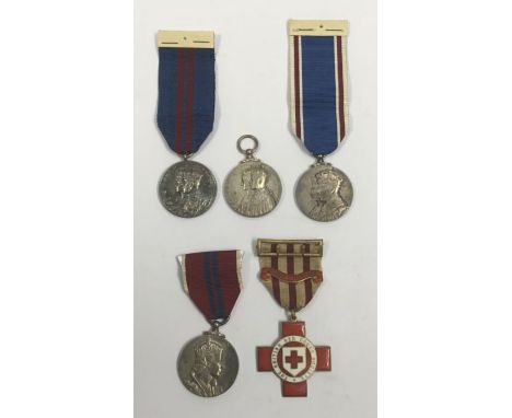 A selection of Coronation and Jubilee Medals, plus a an enamel Red Cross example.To include: a 1911 Coronation medal with rib