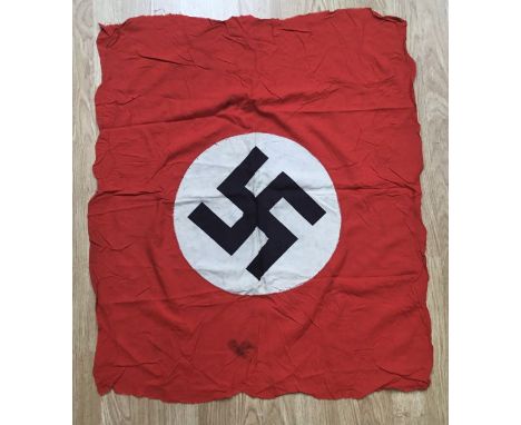 A WW2 era NSDAP party flag or drape for a podium.Screen printed white circular panel, chain stitched to a red cotton base.Dou