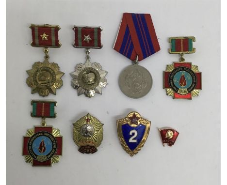 A selection of post WW2 Soviet Russian Medals and Badges.To include:A medal for distinction in military service 1st classA me