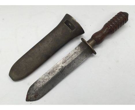 A 20th century divers knife by Siebe Gorman & Co.Type 4 pattern, with ring turned and waisted wooden handle.Brass cross guard