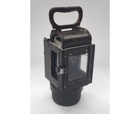 A WW2 era German Bakelite carbide lamp.Predominantly of Bakelite construction, with a metal concave reflector panel to the in