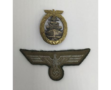 WW2 era German High Seas Fleet Badge.Gilt washed oak leaf wreath and eagle to the front, with a ‘coke bottle’ pin to the reve