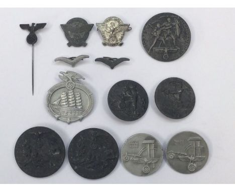 A selection of WW2 and earlier German insignia, badges / tinnies.To include: an NSDAP SA stick pin (RZM marked), 2 luftwaffe 