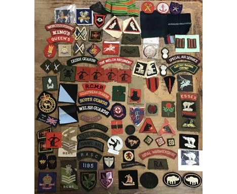 Collection of British Army identification flashes &amp; rank slides from WW2 to modern.