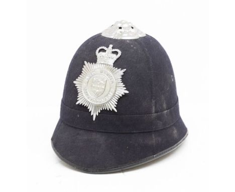 A vintage post 1953 police officers helmet for the West Mercia Constabulary.Chromed badge with Queen’s crown fixed to the fro