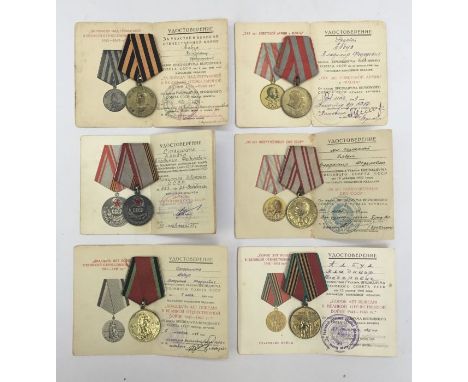 A group of 6 Soviet era medals, with accompanying award documents to the same man.To include:Medal for victory over Germany i