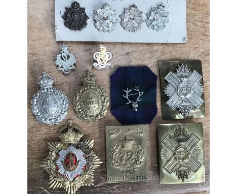 Collection of Military uniform badges, includes 72nd Own Highlands cross belt plate, Royal Scots helmet plate, two Kings Live