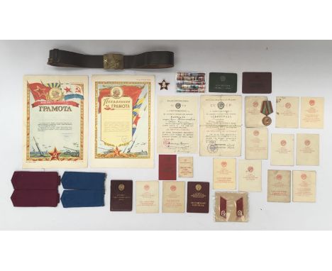 A selection of WW2 and later Soviet Russian medals / badges, award documents, identification documents, epaulettes, collars t