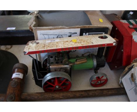 A Mamod steam tractor with original box