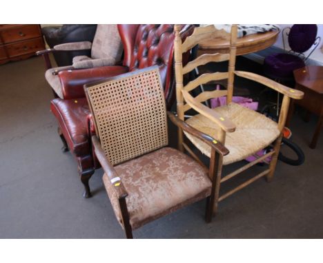 A cane back armchair together with a mahogany ladder back armchair