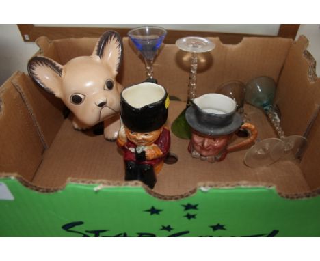 A box containing two Beswick jugs; Sylvac dog ornament etc