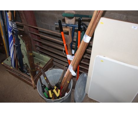 A small galvanised dust bin and a quantity of tools 