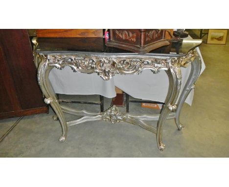A silver coloured console table