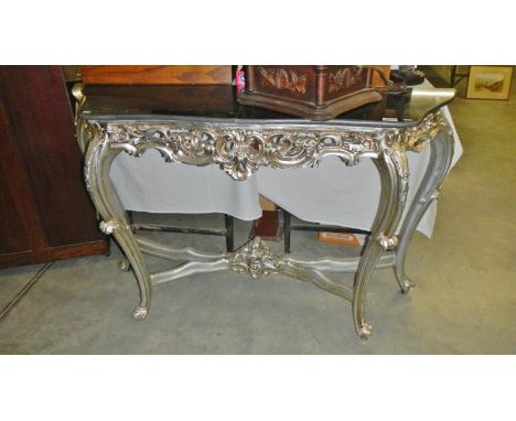 A silver coloured console table