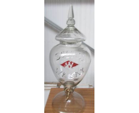 A Scotch whisky dispenser with brass tap.  (Please note: we are unable to insure glass for transit so recommend that the winn
