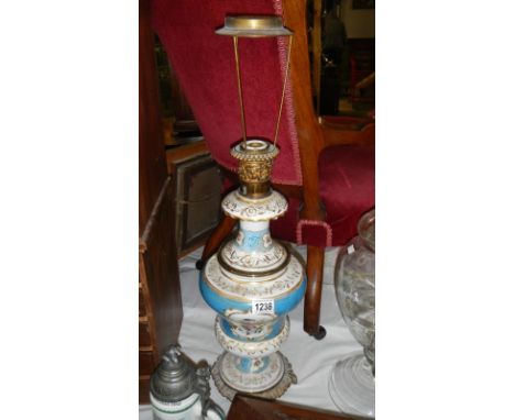 A pottery oil lamp base.
