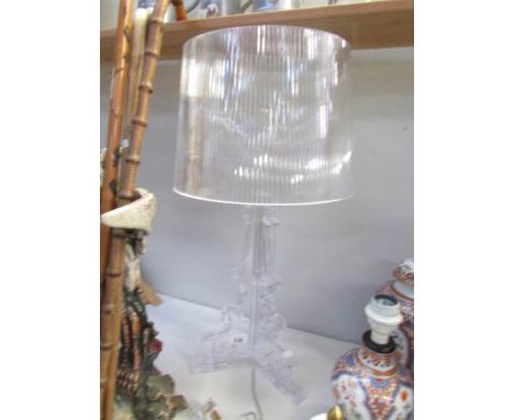 An acrylic table lamp.