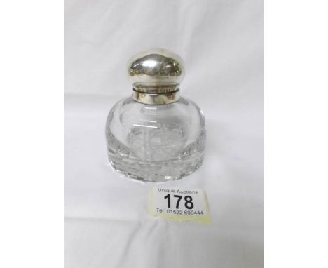 A silver topped inkwell, J G &amp; S, London 1901.