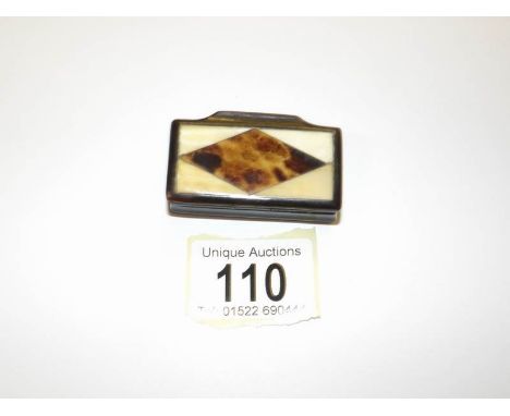 A horn, bone and tortoise shell snuff box.