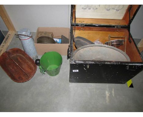 A quantity of enamel and metal kitchen ware.