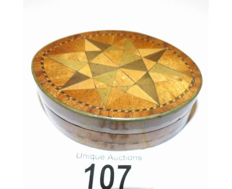 A 19th century inlaid snuff box.