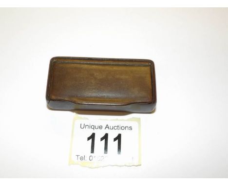 A 19th century horn snuff box.