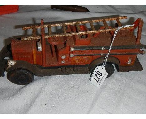 A cast iron reproduction fire engine.