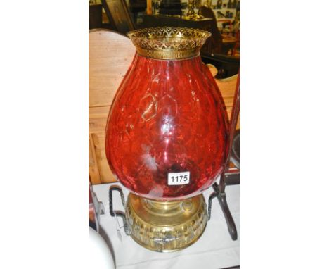A massive heater pulpit oil lamp, circa 1860-1900.  Squat base with twin twist steel handles, one each side, on a patterned b