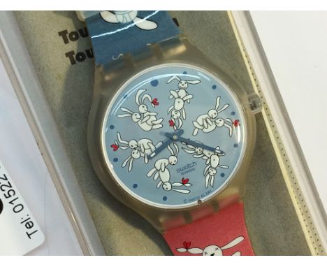 A Swatch AG2003 special edition watch featuring bunny rabbits in compromising positions. Complete with case, booklet, paperwo